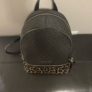 NEW Michael Kors leopard Back pack purse Brand no tags never been used. NEW